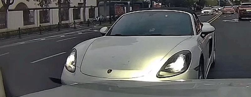 “下次不要被我碰到，绝对把你撞了”，保时捷车主被行拘